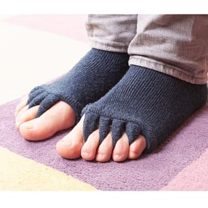 Toe spacing socks used to reduce toe crowding